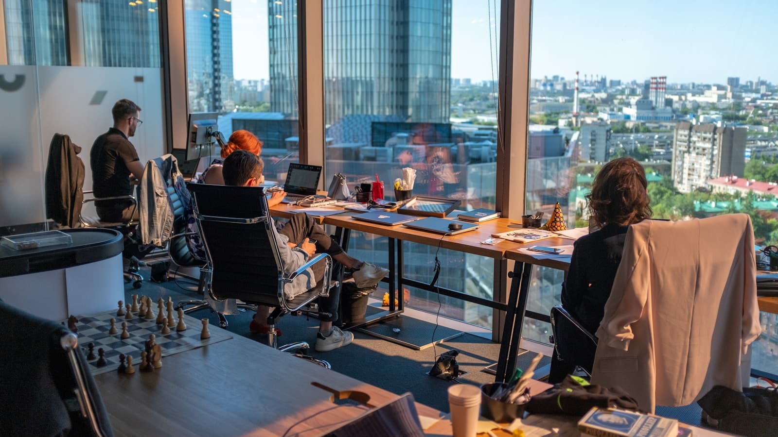 A creative agency team working together in a modern studio